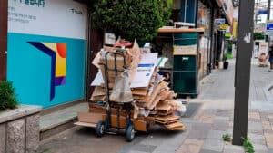 Read more about the article Why Do People Collect Cardboard in South Korea?